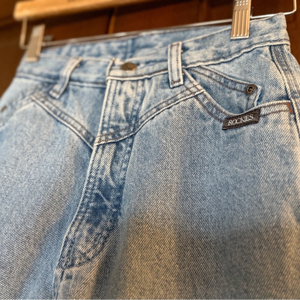 Rockies Authentic Vintage Light Blue Jeans with unique Mountain patch on back.